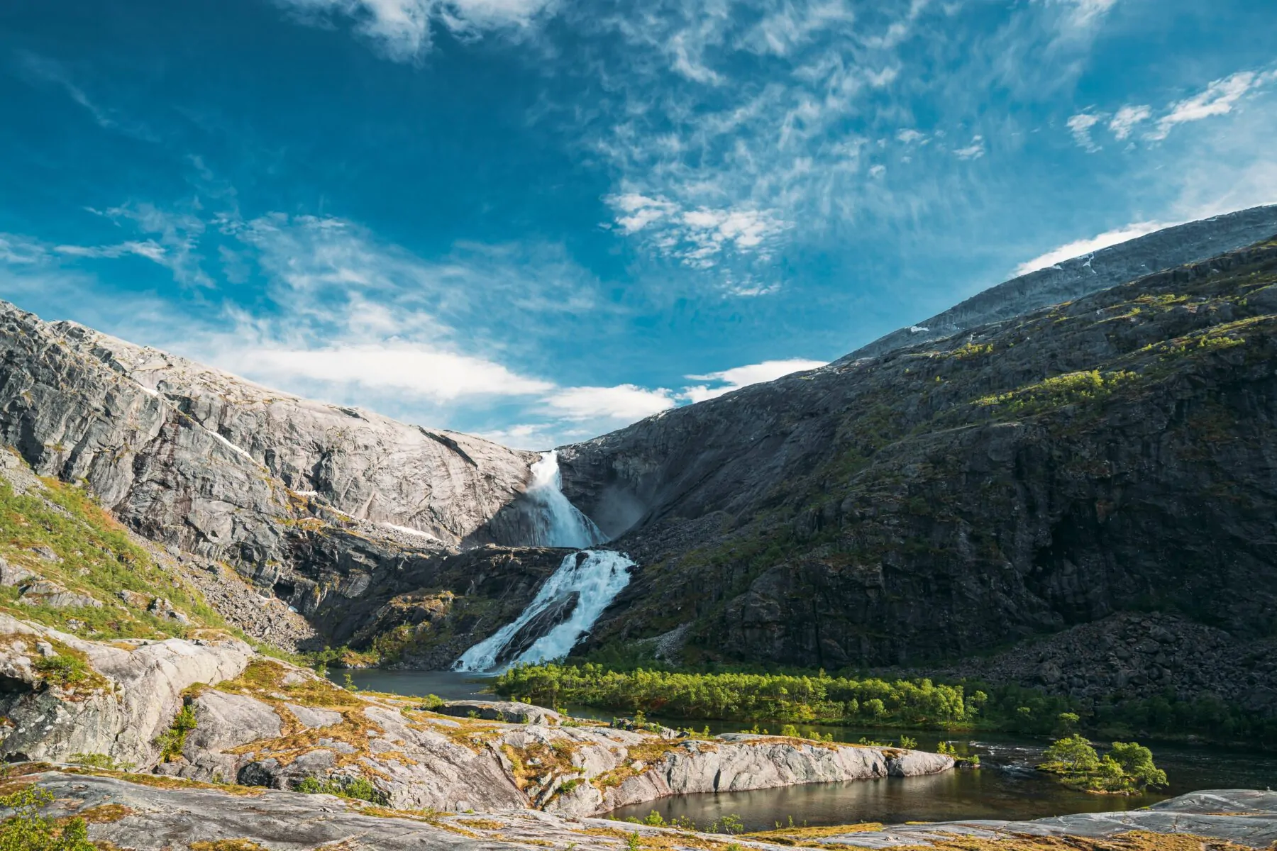 Waterfall Nykkjesoyfossen In Hardangervidda Mountain Plateau.